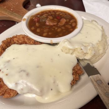 Carriage Crossing Restaurant and Bakery - Chicken fried chicken with beans.  The beans are excellent - Bakeries Near Me - Yoder, Kansas