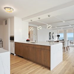 Post Services - Luxury kitchen with quartz and Wolf and sub zero finishes.