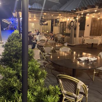 Chloe's Bistro - We're outside tables, but not showing the water which they overlook on - Italian Near Me - Boca Raton, Florida Chloe's Bistro - We're outside tables, but not showing the water which they overlook on - Italian Near Me - Boca Raton, Florida