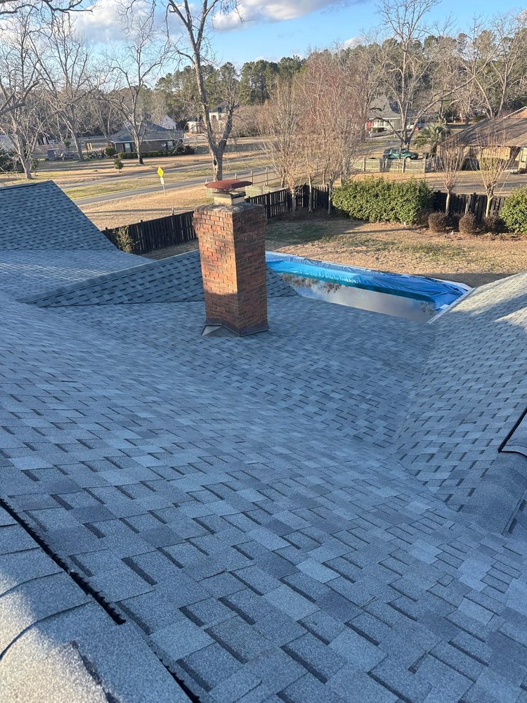 Slide of Palma's Roofing Experts