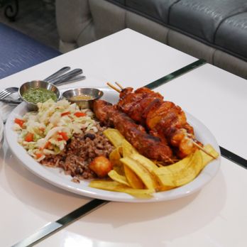 Nica Lounge - a plate of food on a table - Lounges Near Me - Concord, California