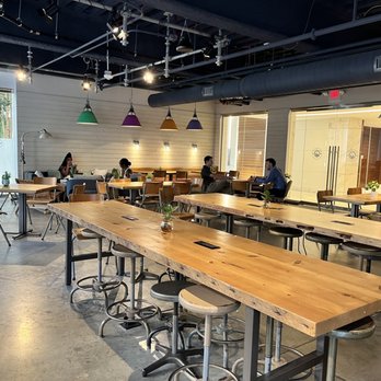 Waterbean Coffee - tables and stools in a coffee shop - Coffee & Tea Near Me - Charlotte, North Carolina Waterbean Coffee - tables and stools in a coffee shop - Coffee & Tea Near Me - Charlotte, North Carolina