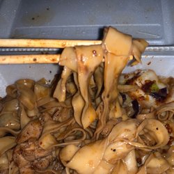 The Noodle Lady - Fried noodles with some chili sauce and chicken added. 5/5 stars!