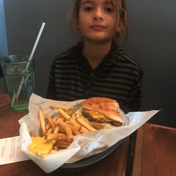 Firewood - Chowin down on a cheeseburger!! - New American Near Me - Murphys, California
