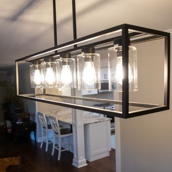 Eloizard Carpentry - a kitchen and dining room - General Contractors Near Me