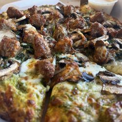 Spinach, sausage, mushroom with pesto sauce.