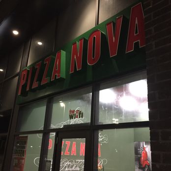 Pizza Nova - the front of a restaurant at night - Pizza Near Me - Innisfil, Ontario Pizza Nova - the front of a restaurant at night - Pizza Near Me - Innisfil, Ontario