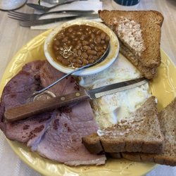 Twi eggs medium, ham steak, beans and rye toast