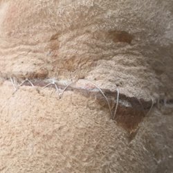 Coronado Shoe Service - Ruined Boot with Glue and Crappy stitch instead of properly sewing two panels that came unstitched.