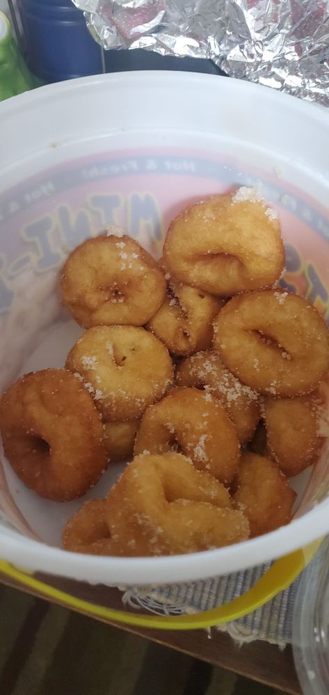 The Cinnabomb Mini Donut Factory Logo