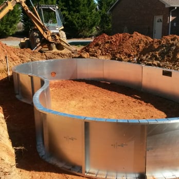 Superior Pools - superior pools right now building this pool with steel steps 6foot sun shelve kidneypool with over thirthy yards of concrete - General Contractors Near Me - Kings Mountain, North Carolina