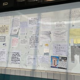 So many Chinese ads on right wall by entrance So many Chinese ads on right wall by entrance