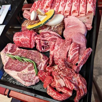 Cow Wow Korean BBQ - Cow Wow Combo Serving for 4. $199.99. Brisket; Boneless, Fresh, and Marinated Short Rib; Ribeye; Pork Neck; Marinated Rib Fingers. + sides. - Korean Near Me - Suwanee, Georgia Cow Wow Korean BBQ - Cow Wow Combo Serving for 4. $199.99. Brisket; Boneless, Fresh, and Marinated Short Rib; Ribeye; Pork Neck; Marinated Rib Fingers. + sides. - Korean Near Me - Suwanee, Georgia