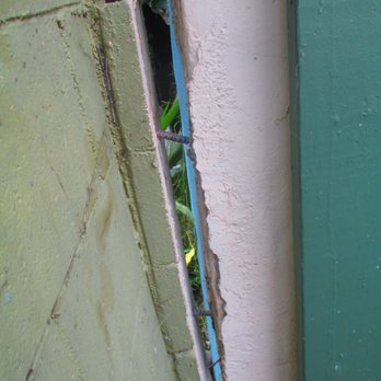 Bobcat Concrete and Masonry - pinning wall to garage with rebar - Masonry/Concrete Near Me Bobcat Concrete and Masonry - pinning wall to garage with rebar - Masonry/Concrete Near Me