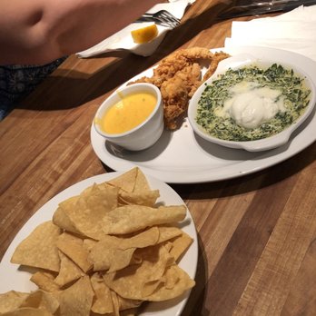 Cheddar's Scratch Kitchen - The trio appetizer here. Queso, spinach dip and tenders w chips. A good deal. - American Near Me - Waco, Texas