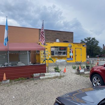 Taqueria Lopez - cars parked in front of a taqueria lopez - Tacos Near Me - Dover, Ohio