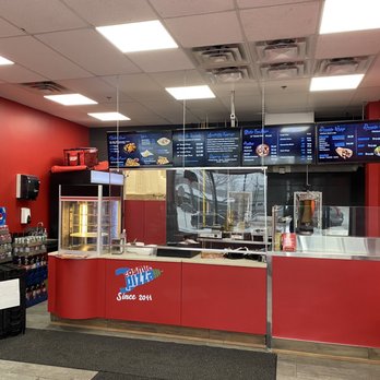 Cosmic Pizza - the interior of a fast food restaurant - Pizza Near Me - Edmonton, Alberta