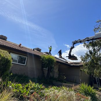 Escalante Roofing - Shingles craned on. I remember when the fellas had to sling them over the shoulders and up the ladder u go - Roofing Near Me - Vallejo, California