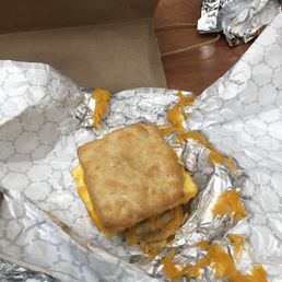 Yellow light donut biscuit sandwich Yummy egg cheese and sausage Yellow light donut biscuit sandwich Yummy egg cheese and sausage