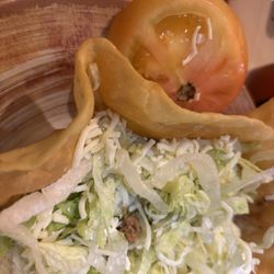Los Reyes Mexican Grill - This is a taco salad What's not worth the $13.09 I had so much lettuce the meat was so salty the tomato look like it was rotten