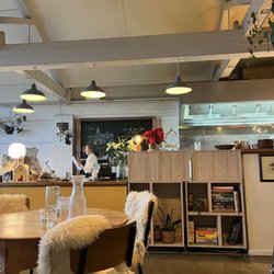 Hunger Monger - The dining room has a view of the kitchen over the counter.
