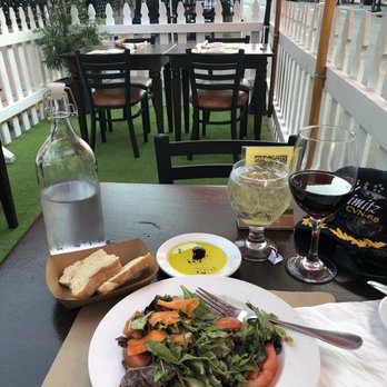 Operacaffe - House salad, crusty bread with olive oil and balsamic vinegar and the house Chianti - Italian Near Me - San Diego, California