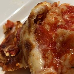 Polito's Pizzeria Restaurant - Slice of pizza that should have extra cheese pepperoni and sausage