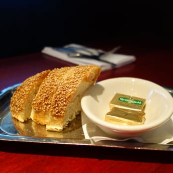 Lucky 32 Southern Kitchen - Sesame Bread with Kerrygold butter - New American Near Me - Cary, North Carolina Lucky 32 Southern Kitchen - Sesame Bread with Kerrygold butter - New American Near Me - Cary, North Carolina