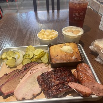 True Texas BBQ - 3 meat plate with another order of sausage. - Barbeque Near Me - Magnolia, Texas