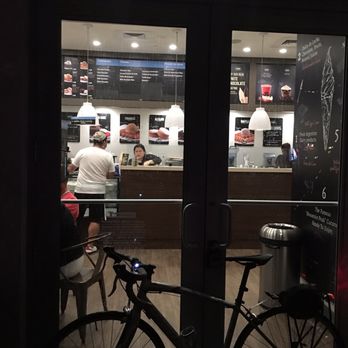 Freddo - We rode bike from the grove (even in the rain) just to be turned away at 10:55 by this lady.  ...at least she let that guy in. - Desserts Near Me - Miami, Florida