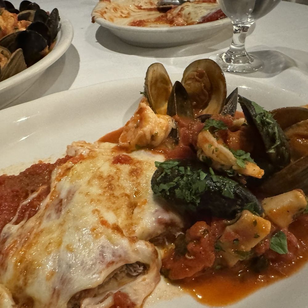 Veal Parmesan and seafood marinara Veal Parmesan and seafood marinara