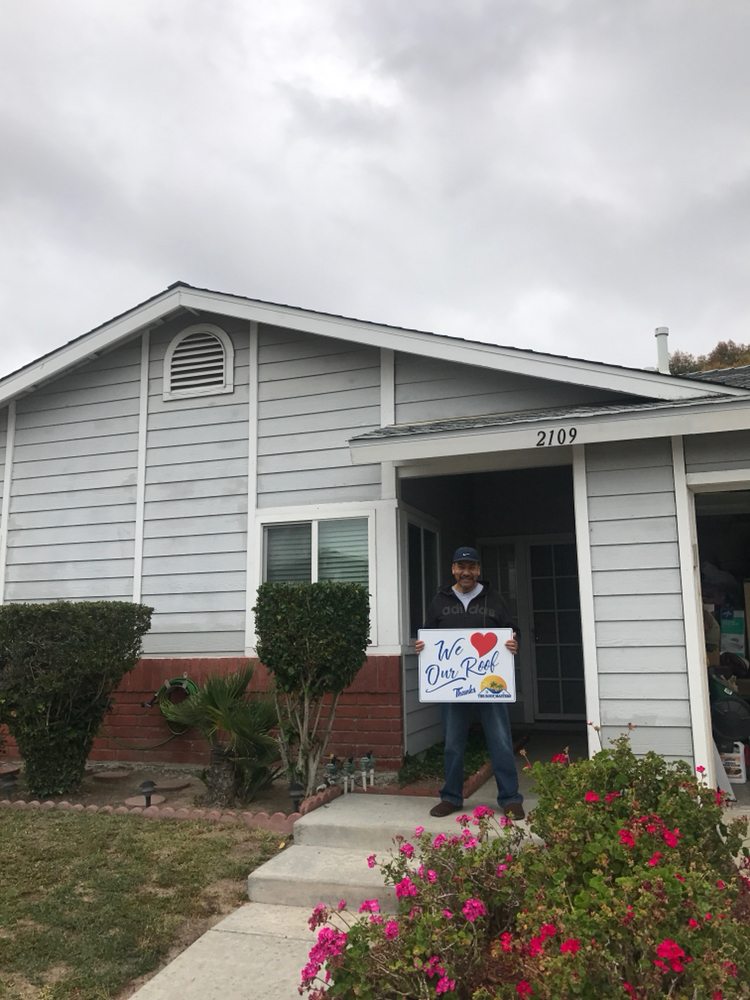 Slide of The Roof Masters