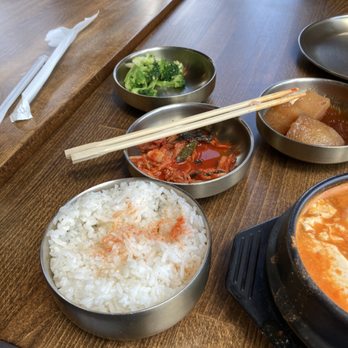 Arisu Korean BBQ & Tofu - This shows the ban chan dishes, rice, and part of the entre. - Barbeque Near Me - Murfreesboro, Tennessee Arisu Korean BBQ & Tofu - This shows the ban chan dishes, rice, and part of the entre. - Barbeque Near Me - Murfreesboro, Tennessee