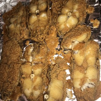 J & J Fish & Chicken - This place is beyond HORRIBLE!  Take a look at the garbage 12 piece fish that was sold.  Do not buy food there! - Seafood Near Me - Lansing, Illinois