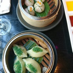 Prawn and chive gau along with a wasabi scallop