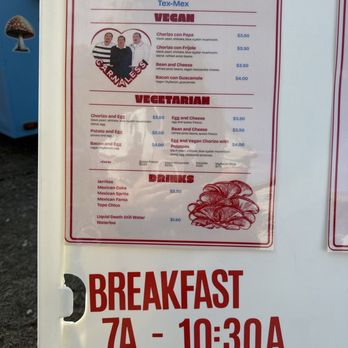 Carnaless - Vegan Tex Mex Breakfast menu 7:00-10:30 am Tuesday-Wednesday- Thursday. - A menu board for Carnaless Tex-Mex restaurant displays vegan, vegetarian, and drink options with prices, including breakfast hours from 7 AM to 10:30 AM. - Vegan Near Me - Austin, Texas