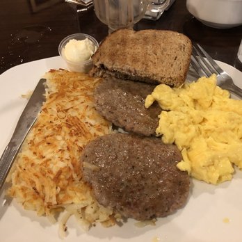 Uptown Cafe - Sunrise breakfast with hash browns, scrambled eggs, 2 sausage patties, and toast. - Breakfast & Brunch Near Me - Johns Creek, Georgia Uptown Cafe - Sunrise breakfast with hash browns, scrambled eggs, 2 sausage patties, and toast. - Breakfast & Brunch Near Me - Johns Creek, Georgia