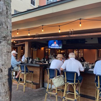 The Cooper - Outdoor bar and seating - American Near Me - Palm Beach Gardens, Florida The Cooper - Outdoor bar and seating - American Near Me - Palm Beach Gardens, Florida