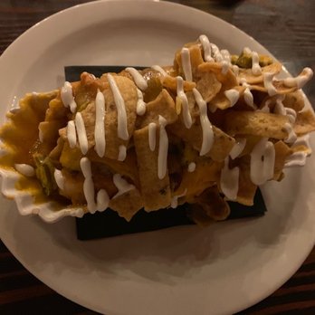 Gigglewaters - Bacon wrapped hotdog with chili, cheese, fritos, and sour cream - American Near Me - Safety Harbor, Florida