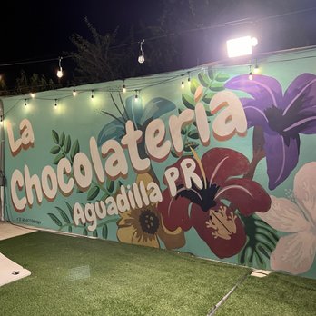 La Chocolatería - signage outside next to corn hole / more photo ops - Chocolatiers & Shops Near Me - Aguadilla, Puerto Rico