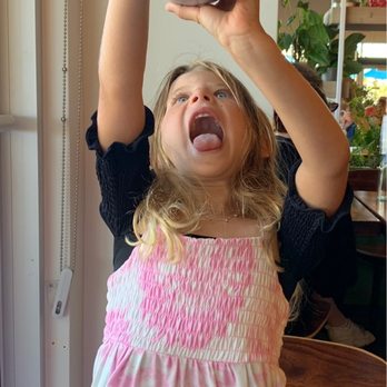 Kihei Caffe Lahaina - Sloane's enjoying the pancake syrup. - Breakfast & Brunch Near Me - Lahaina, Hawaii Kihei Caffe Lahaina - Sloane's enjoying the pancake syrup. - Breakfast & Brunch Near Me - Lahaina, Hawaii