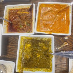 Goat curry, butter chicken and Palak Paneer. Goat curry, butter chicken and Palak Paneer.