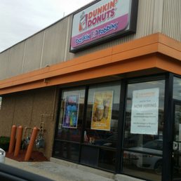 the front of a dunkin donuts store