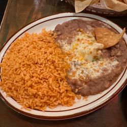 Avila's El Ranchito - Rice and beans/with some cheese on them, dip a chip and it's a little meal in itself.