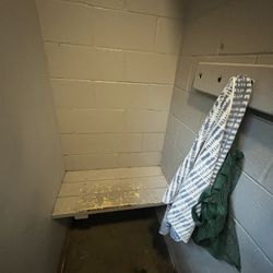 Filling Station - Dressing/dry space in men's shower.