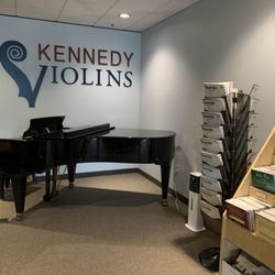 Kennedy Violins - Grand Piano in the showroom.