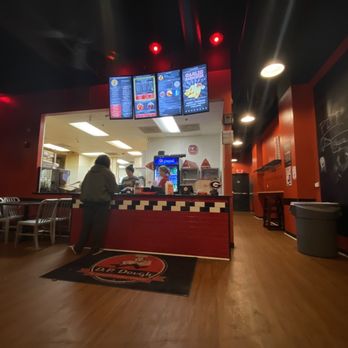 D P Dough - a man standing at a counter in a fast food restaurant - Pizza Near Me - Athens, Georgia D P Dough - a man standing at a counter in a fast food restaurant - Pizza Near Me - Athens, Georgia