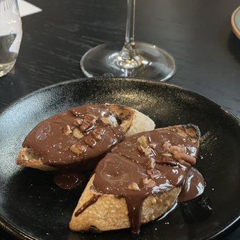 Pluck Wines - Grilled argentine dark chocolate crostini. Yummmmm!!! - Wine Bars Near Me - New Orleans, Louisiana Pluck Wines - Grilled argentine dark chocolate crostini. Yummmmm!!! - Wine Bars Near Me - New Orleans, Louisiana