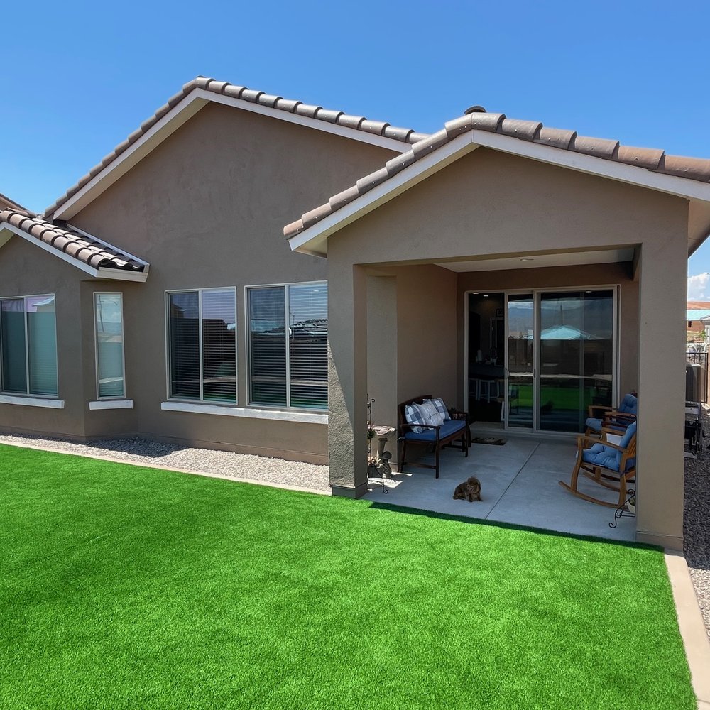 AMG Landscape - Turf and rock fill around the covered patio. - Irrigation Near Me AMG Landscape - Turf and rock fill around the covered patio. - Irrigation Near Me