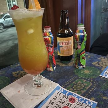 Footsy Magoo's - a glass of orange juice and a bottle of soda - Dive Bars Near Me - Troy, New York Footsy Magoo's - a glass of orange juice and a bottle of soda - Dive Bars Near Me - Troy, New York